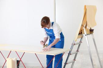 A handywoman working on a project.